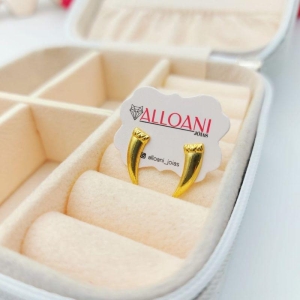 Brinco dente de sabre