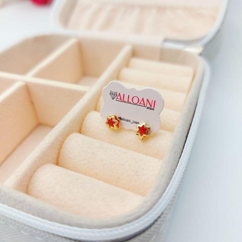 Brinco estrela com pedra vermelha