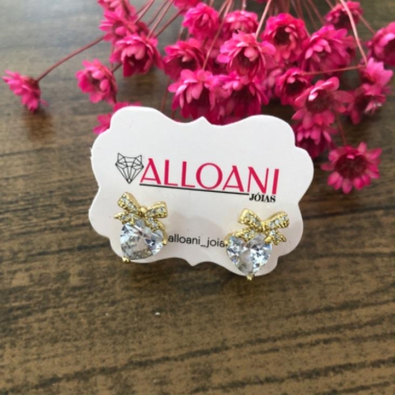 Brinco laço com coração cravejado