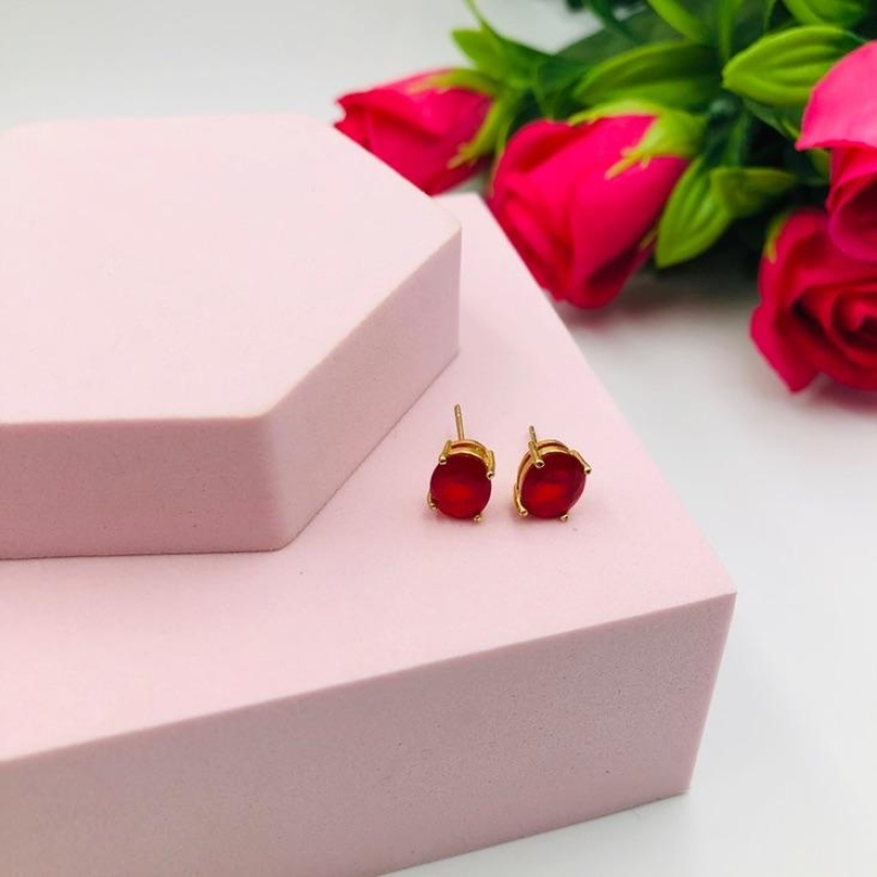 Brinco ponto de luz vermelho