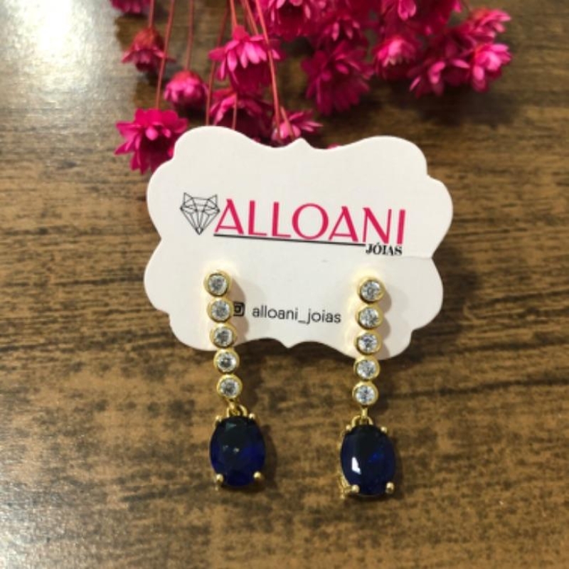 Brinco tira de ponto de Luz com pingente azul