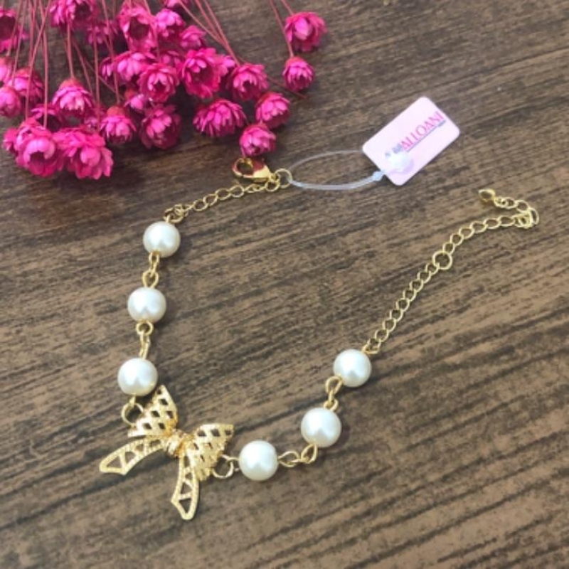 Pulseira Pérolas com Pingente Laço