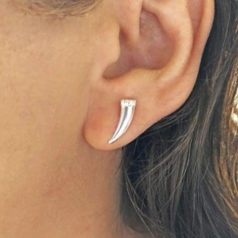 Brinco dente de sabre