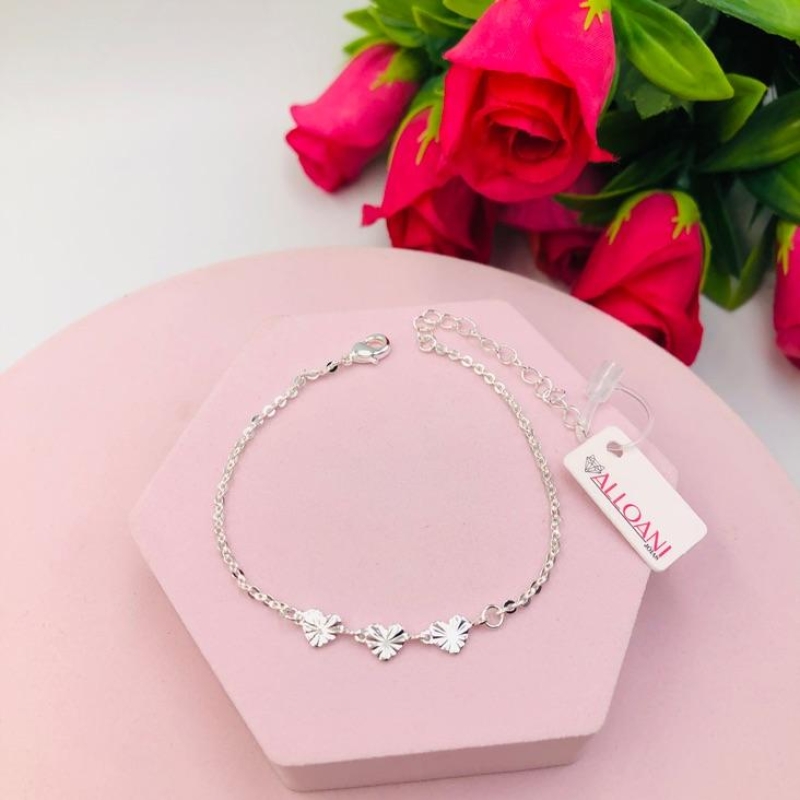 Pulseira três corações