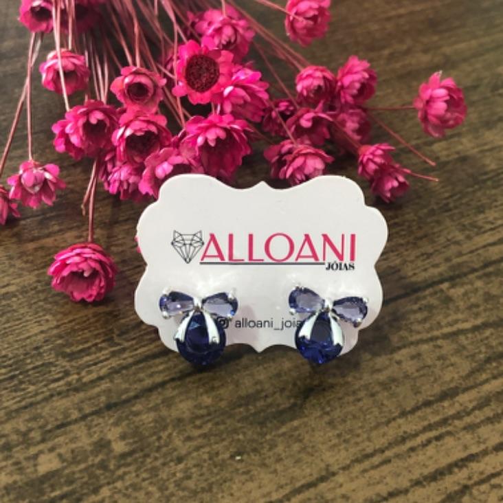 Brinco Laço com Pedras Roxas