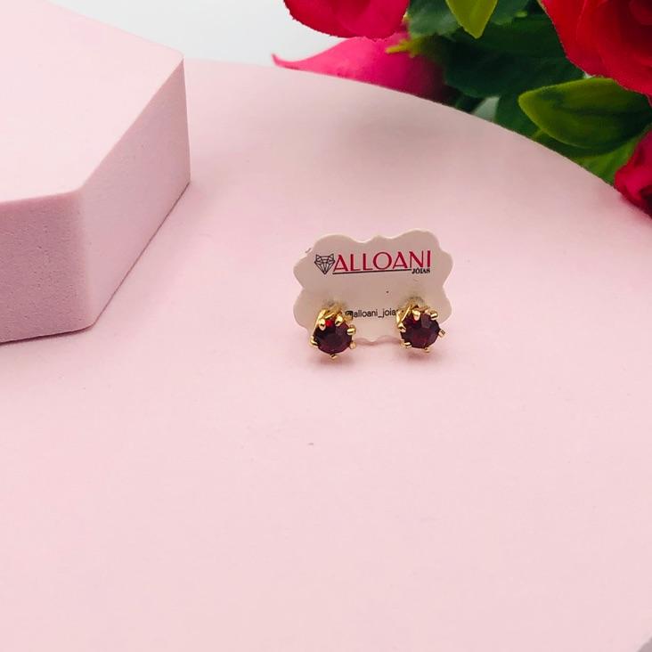 Brinco ponto de Luz vermelho