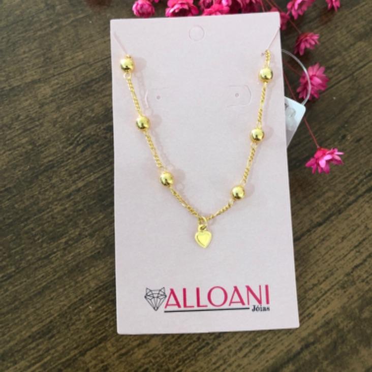 Pulseira bolinha com coração