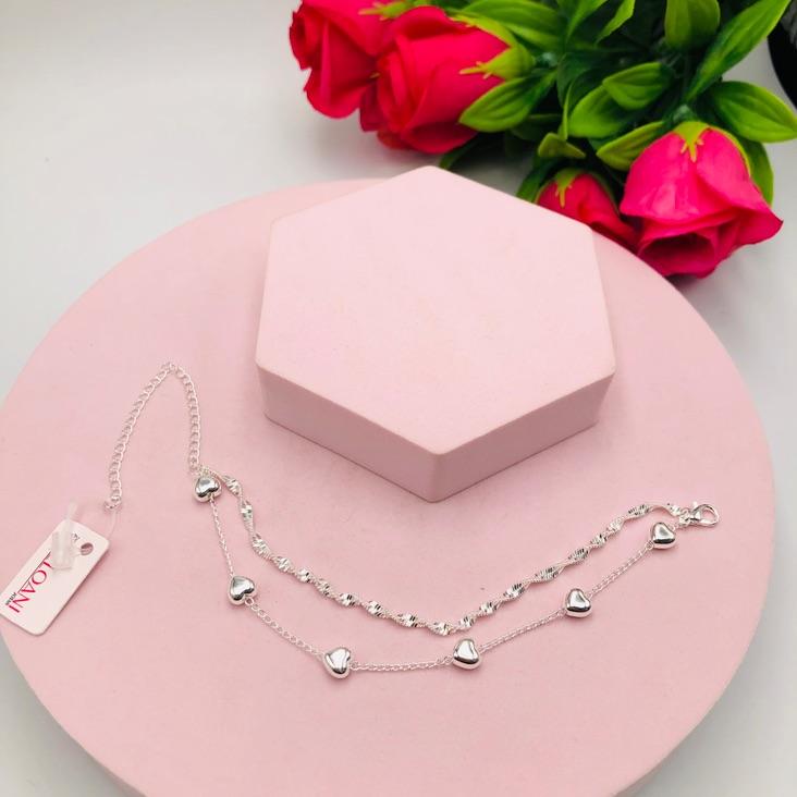 Pulseira Dupla Torcida e Coração